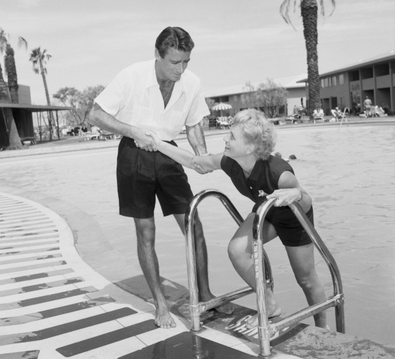 Actors Peter Lawford and Judy Holliday | Getty Images Photo by Bettmann